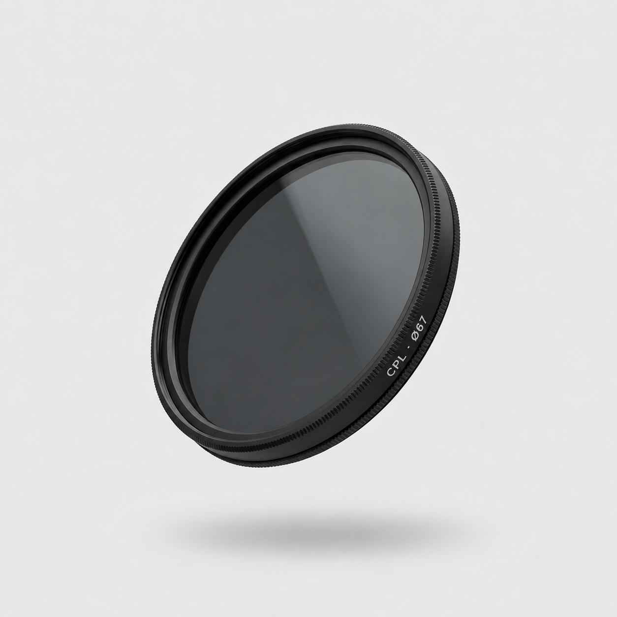 Circular polarizer lens filter on a light gray background